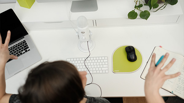 Photo of Marie working at her desk